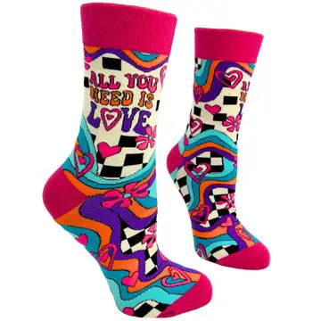 Colorful women's novelty socks with "All You Need Is Love" lettering and vibrant heart and swirl patterns.