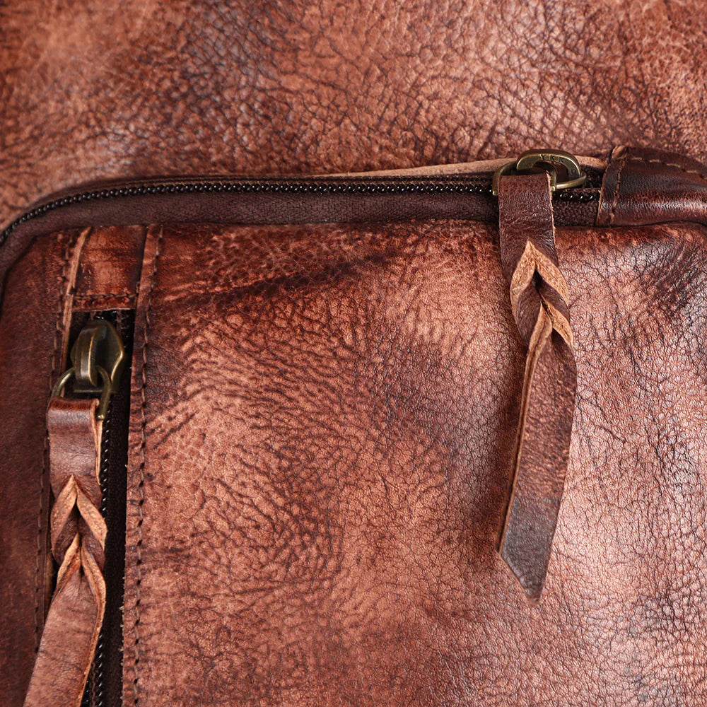Premium authentic full grain leather with durable antique metal fittings.