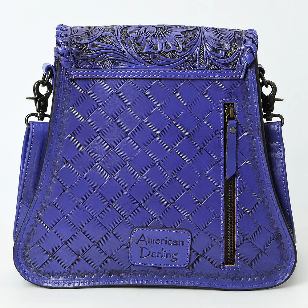 American Darling Small Crossbody Bag in deep purple full grain leather with hand-tooled floral design, braided details, antique metal fittings, and YKK zipper closure
