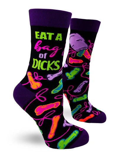 Sassy women's crew socks with "Eat A Bag Of Dicks" phrase and colorful playful design.