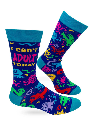Men's novelty crew socks with "I Can’t Adult Today" text and colorful abstract patterns, fits shoe sizes 7-12, cotton blend.