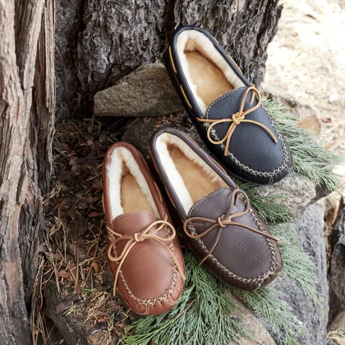 Minnetonka Men's Sheepskin Moose Slipper with moosehide leather, durable rubber sole, and rawhide lace.