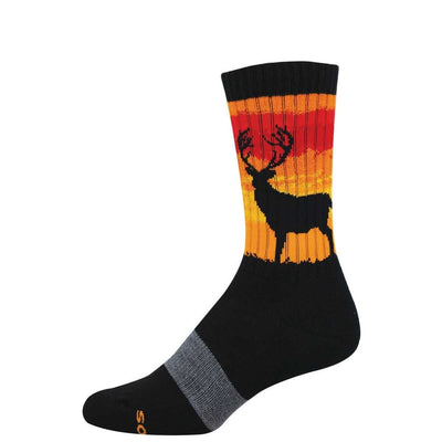 Black crew sock with orange and red sunset design featuring a silhouette of a stag, made with Merino wool blend for warmth and durability Stag Wild Socks
