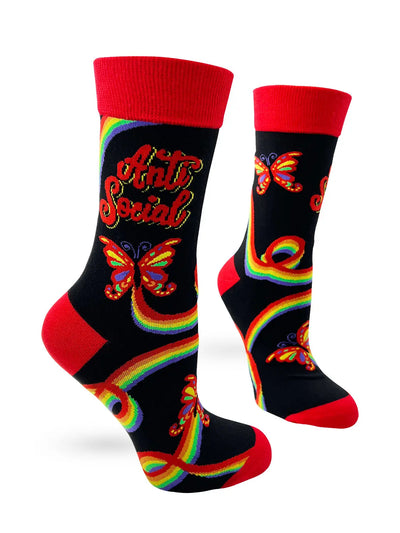 Black women's crew socks with red cuffs and toes, featuring a bold colorful "Anti Social Butterfly" design and rainbow butterfly patterns.