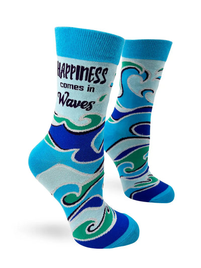 Women's crew socks with "Happiness Comes in Waves" text and blue wave pattern, soft cotton blend.