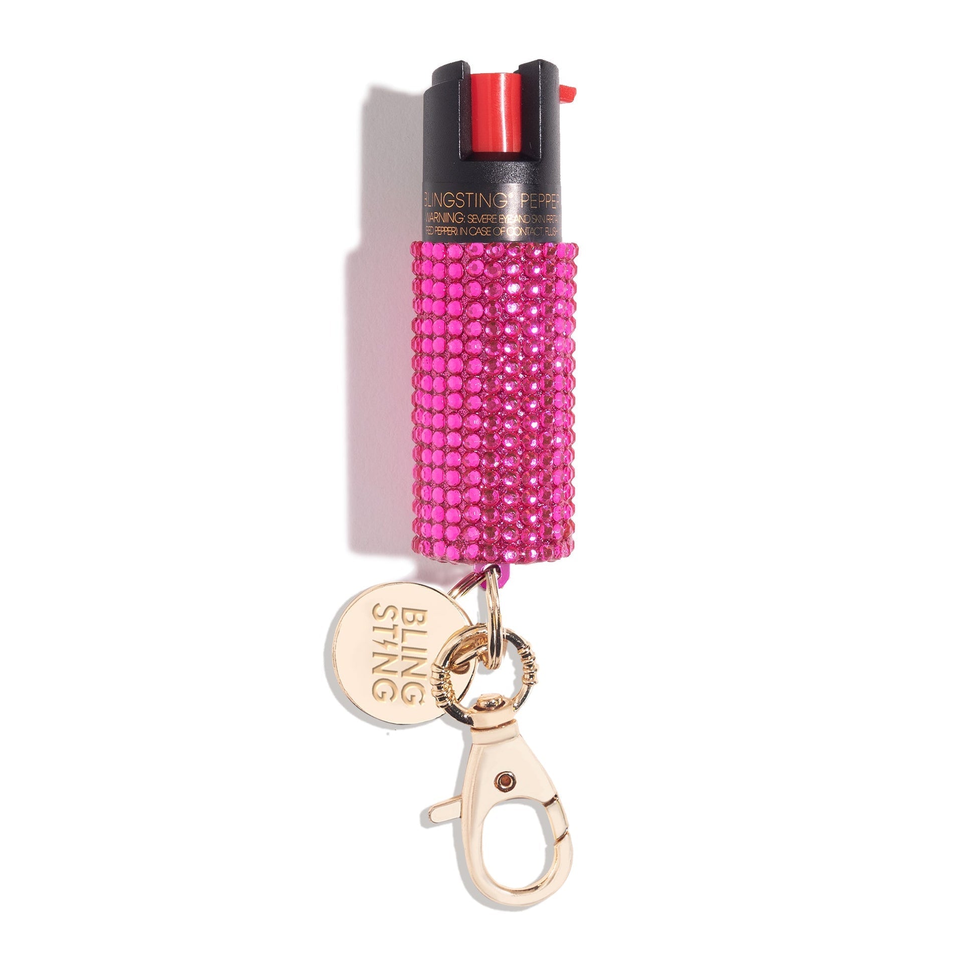 Girl Holding Bling Sting Pepper Spray Pink