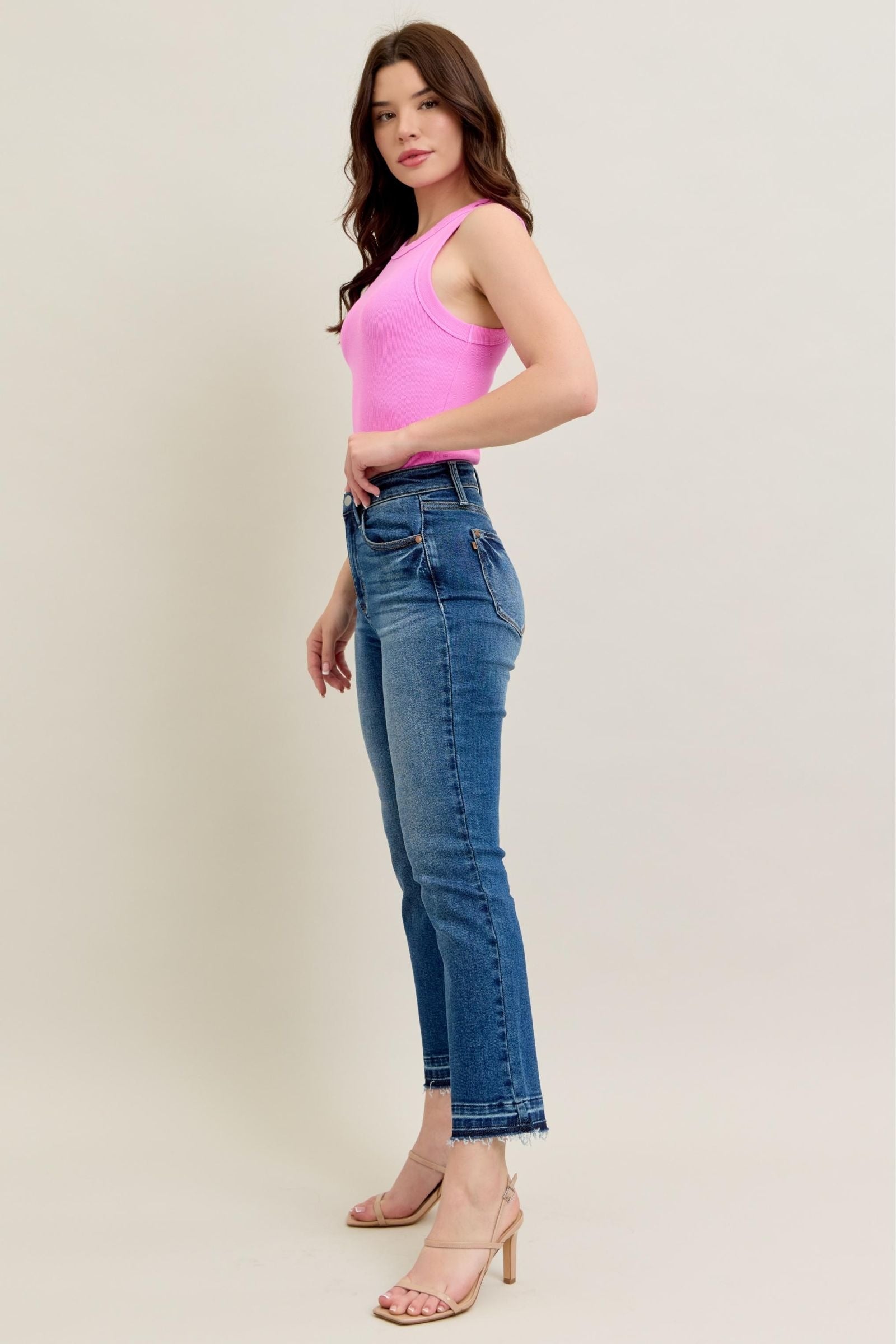 High-rise Judy Blue Jeans with vintage wash and kick flare silhouette.
