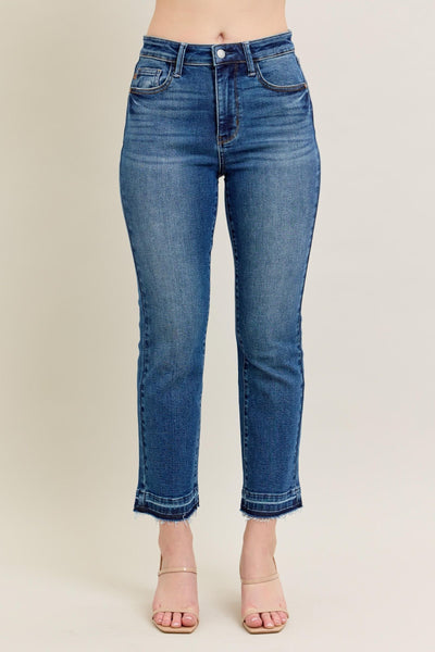 High-rise Judy Blue Jeans 88981 with vintage wash, raw hem, and kick flare silhouette.