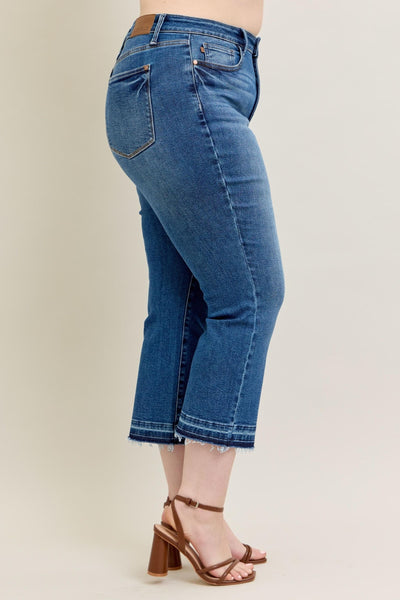 Judy Blue Jeans 88981 with high-rise fit, vintage wash, kick flare, and raw hem.