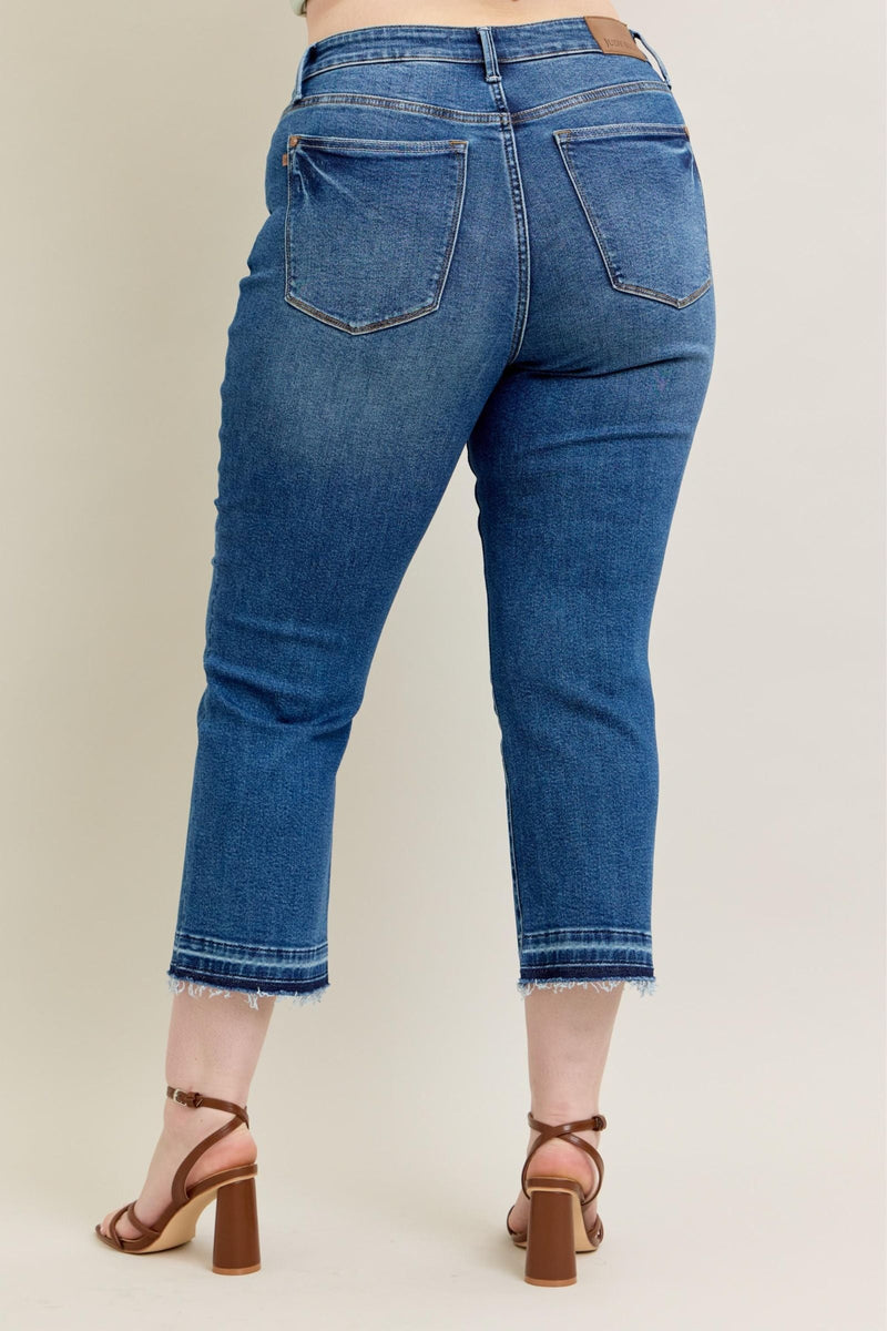High-rise Judy Blue Jeans 88981 with vintage wash and raw hem.