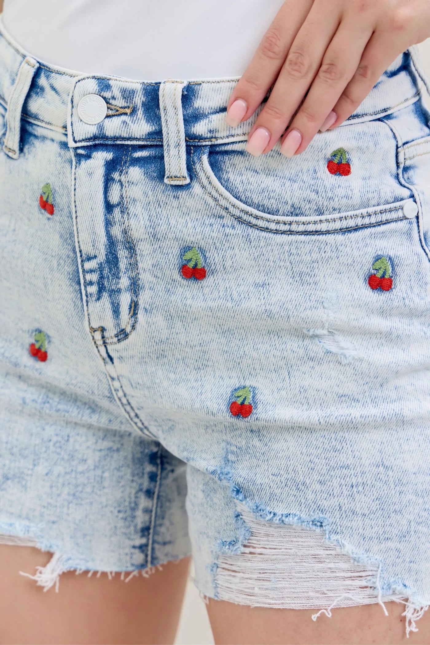 Judy Blue Shorts 150125 with high-rise waist, acid wash, cherry embroidery, and 4" inseam.
