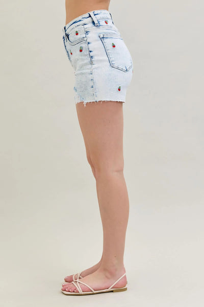 High-rise Judy Blue Shorts with acid wash and cherry embroidery.