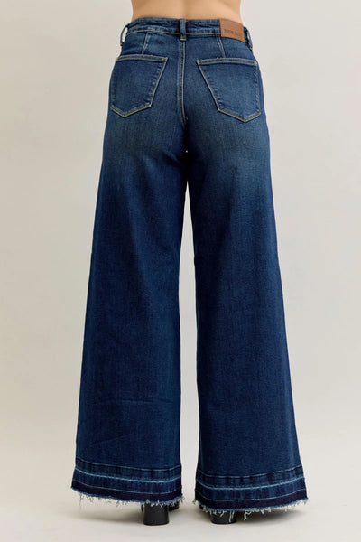 Back view of Judy Blue Jeans 881046 high waist palazzo wide-leg denim with patch pockets and raw hem in dark blue color