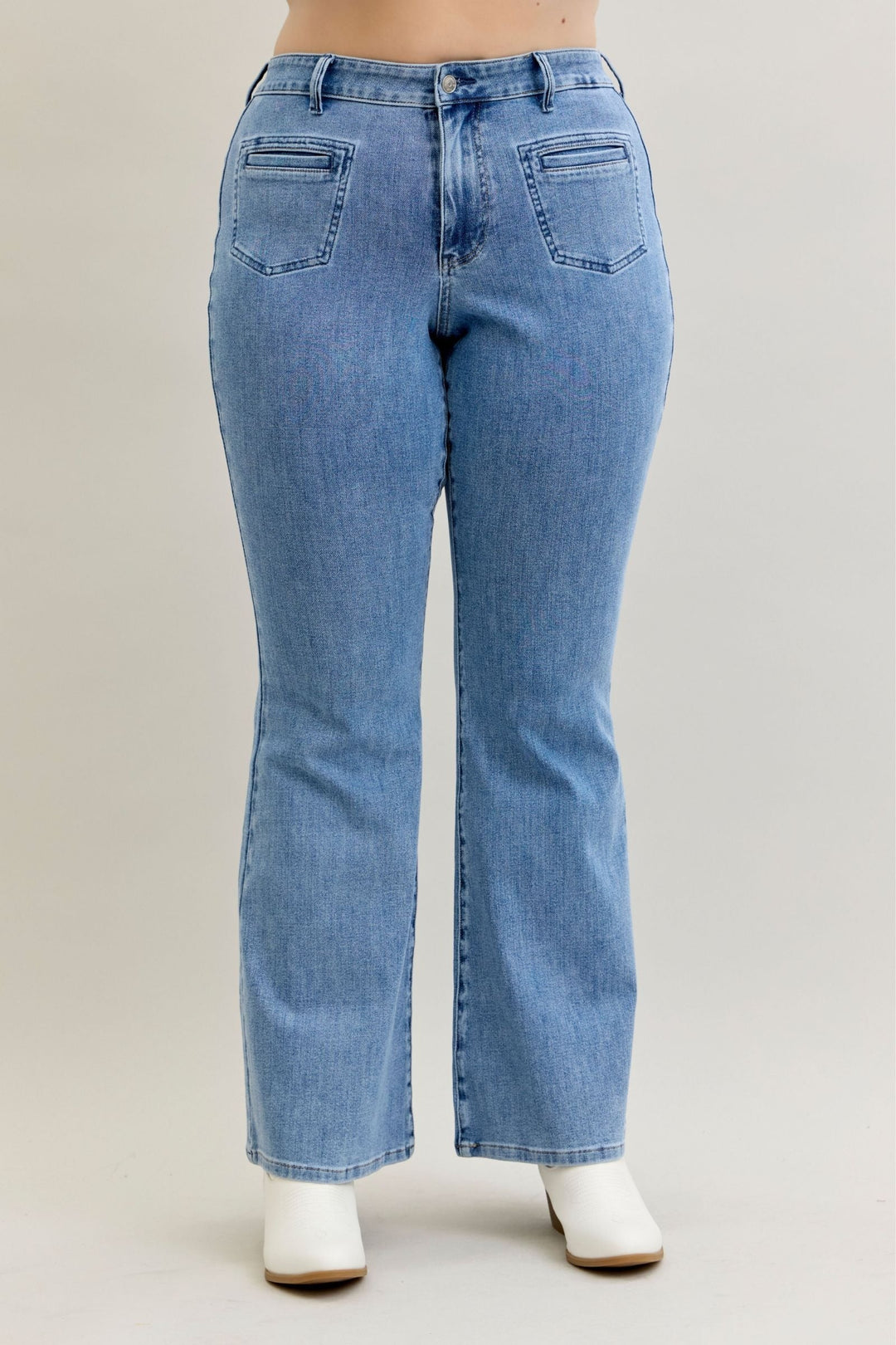 High waist flare Judy Blue Jeans in soft stretch denim with front patch and welt pockets, available in regular and plus sizes