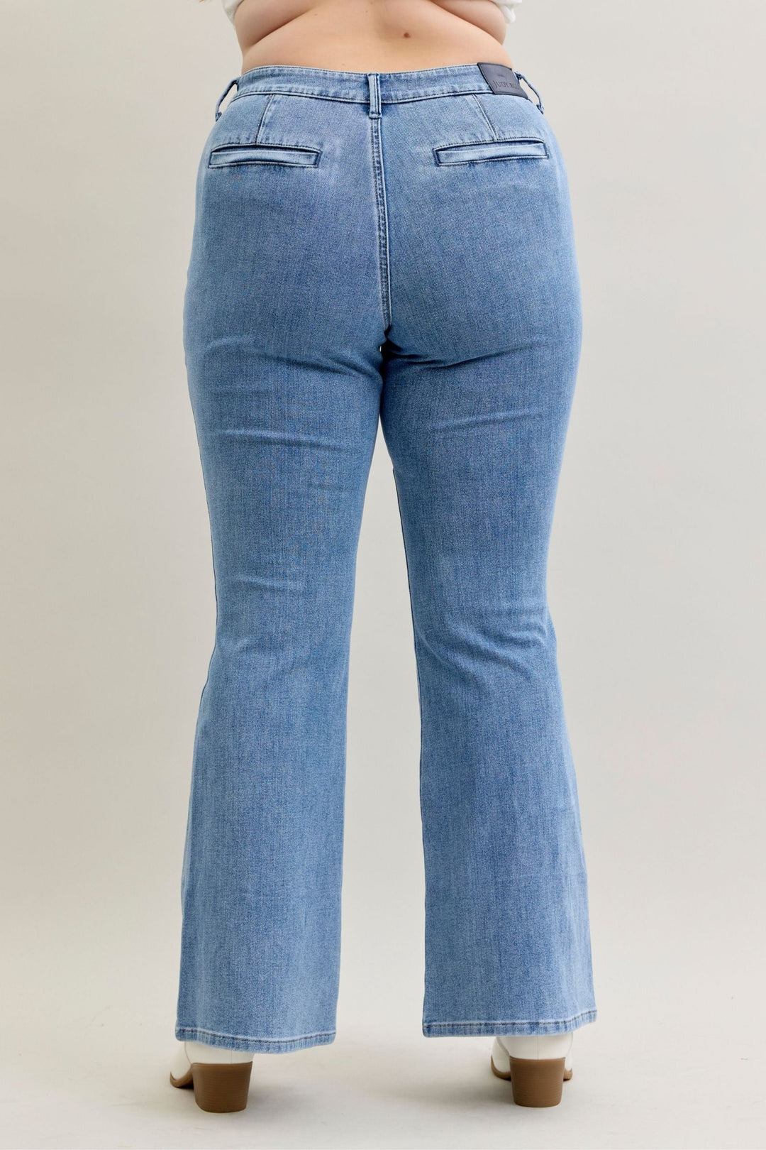 Plus size Judy Blue Jeans high-rise flare fit in soft stretch denim with rear welt pockets and clean finish leg