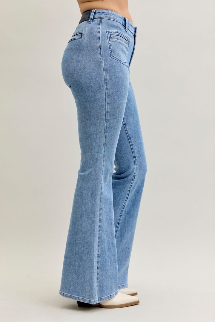 Side view of high-rise flare Judy Blue Jeans in light stretch denim with front patch and welt pockets