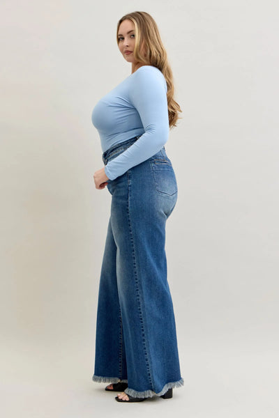 Woman wearing high waist Judy Blue Jeans 881001 with a straight leg and button-fly closure.