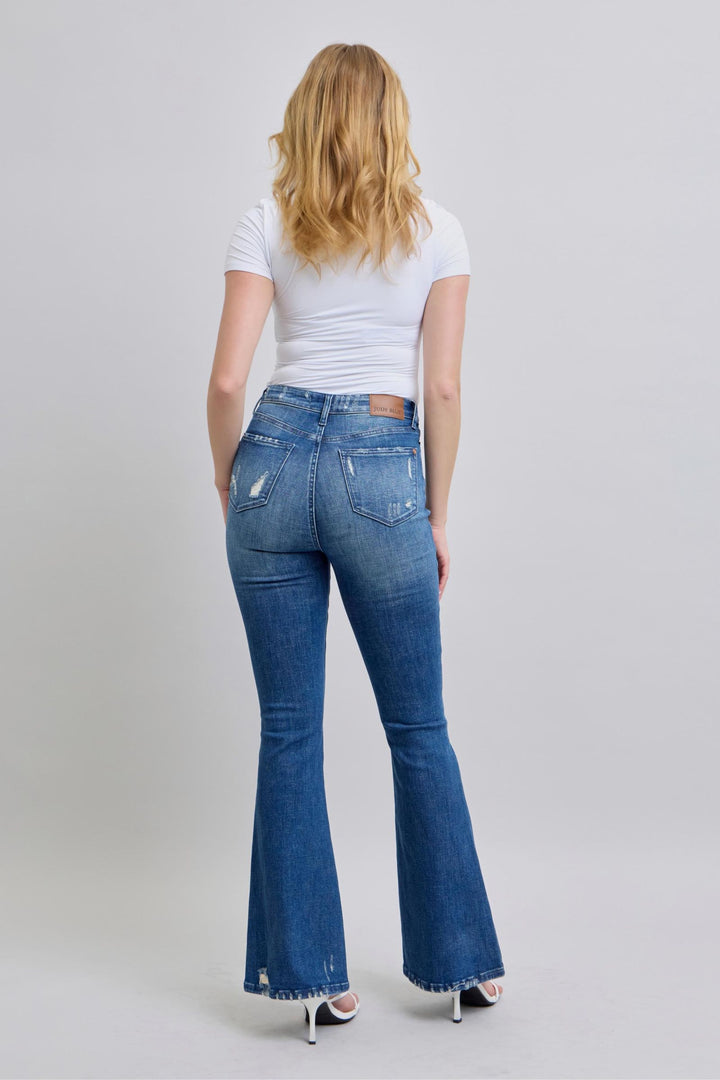 Woman wearing high waist contrast wash destroyed flare Judy Blue Jeans 88383 viewed from the back