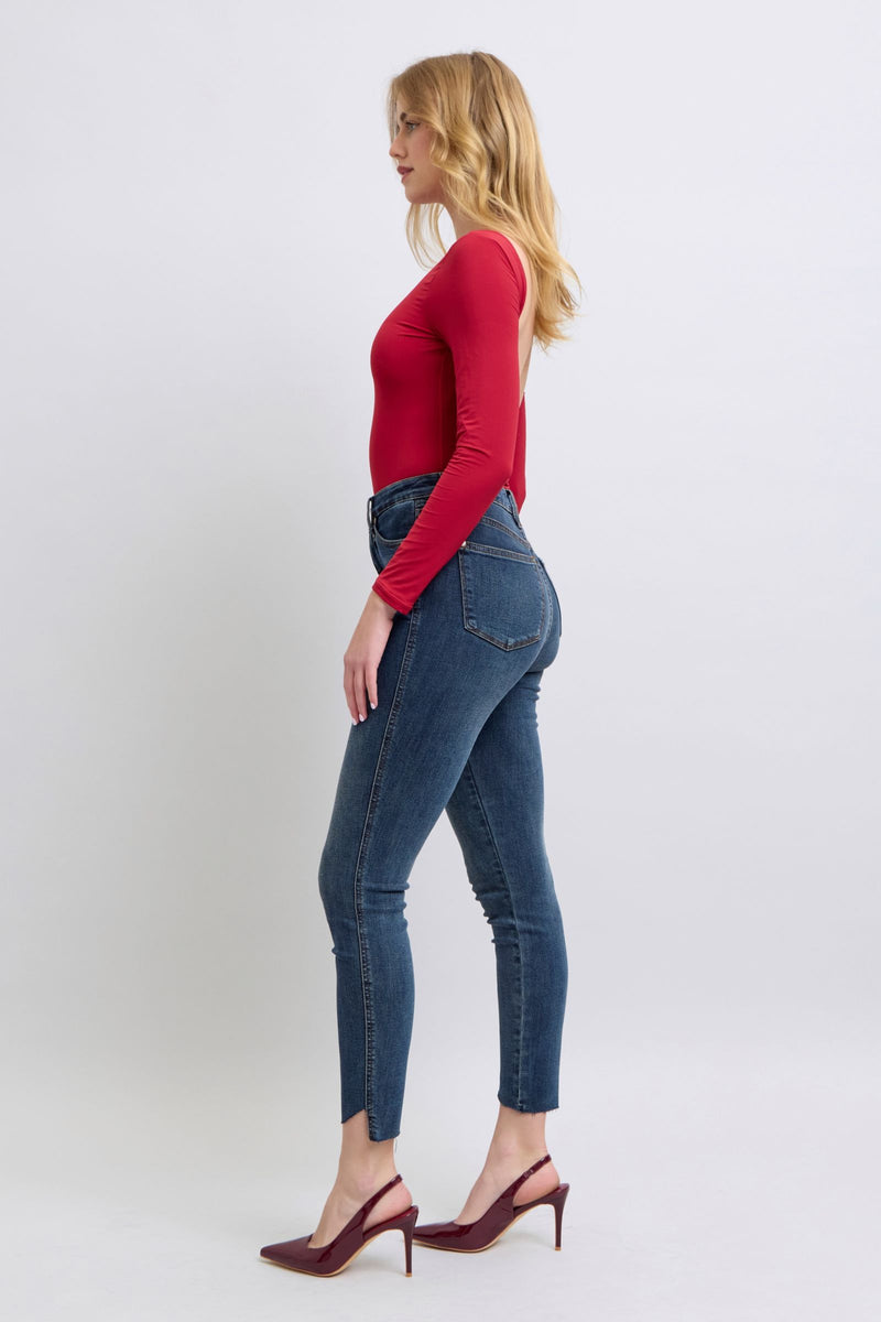 Judy Blue Jeans high waist tummy control skinny jeans with step hem in dark wash worn by model
