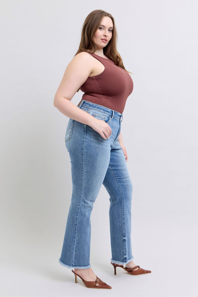 Judy Blue Jeans 82486 high waist frayed hem bootcut, plus-size model, side view.