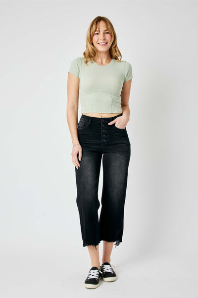 High-rise fit Judy Blue Jeans with distressed design and raw hem detailing, featuring a cropped wide leg cut.