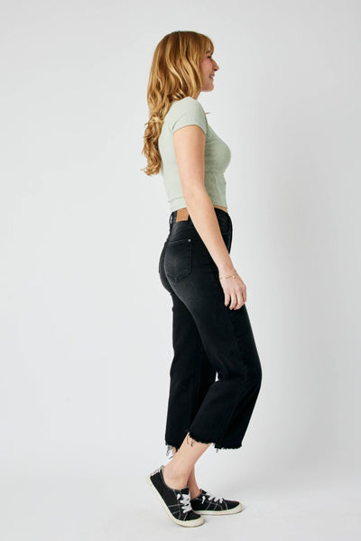 High-rise fit Judy Blue Jeans 88829 with distressed design and raw hem detailing.