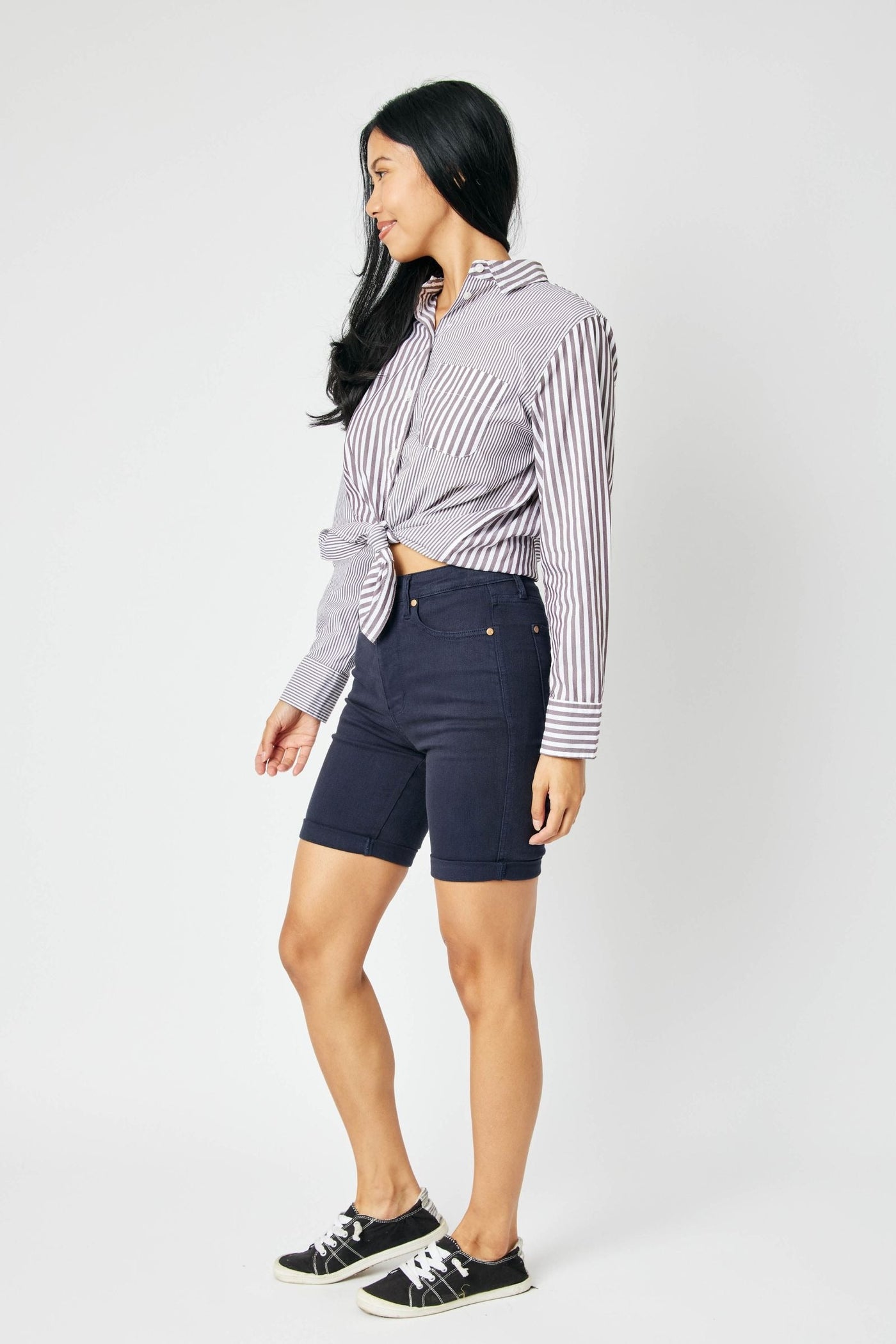 High waist navy Judy Blue Bermuda shorts with tummy control, worn by a model.