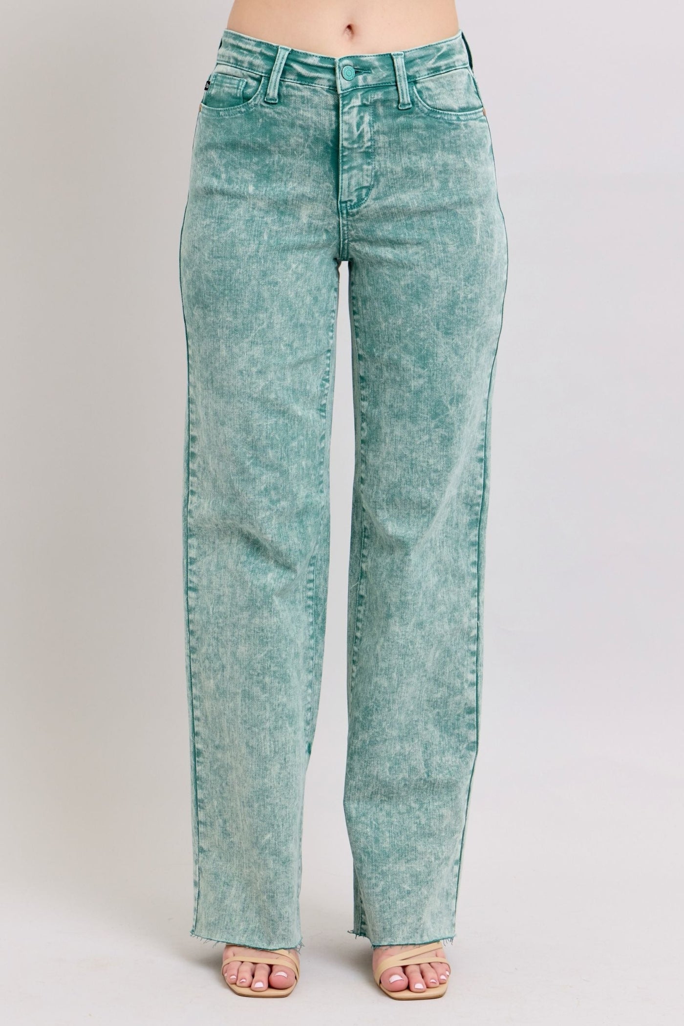 High waist sea green garment dyed dad jeans with raw hem.
