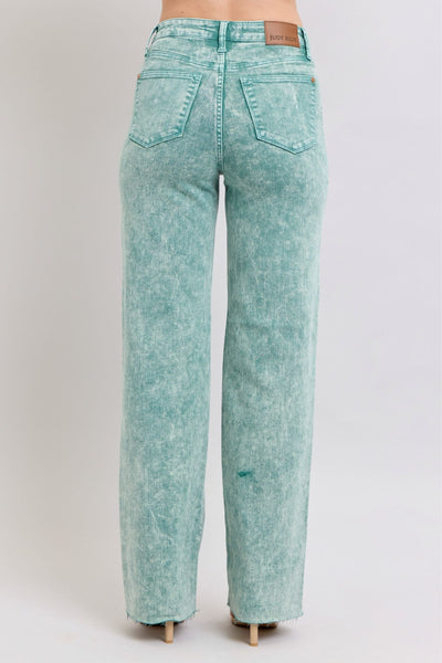 High waist sea green garment dyed jeans with raw hem finish.