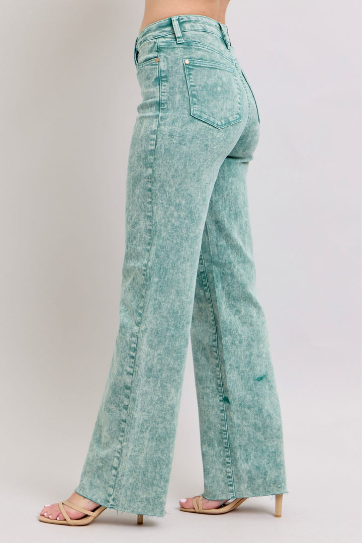 High waist garment dyed dad jeans in sea green with a raw hem for a relaxed fit.