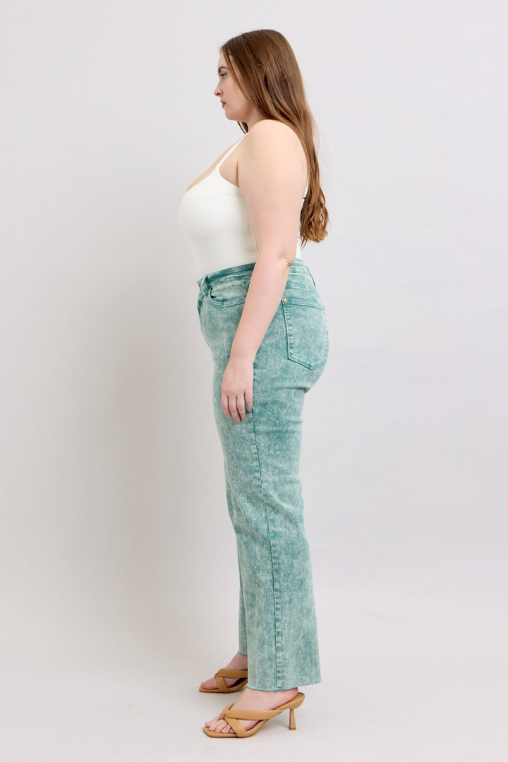 High waist sea green garment dyed jeans with a relaxed straight leg and raw hem.