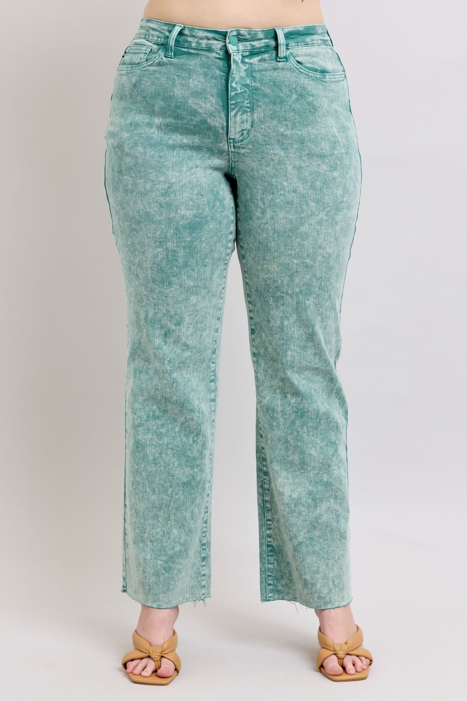 High waist sea green garment dyed dad jeans with raw hem.