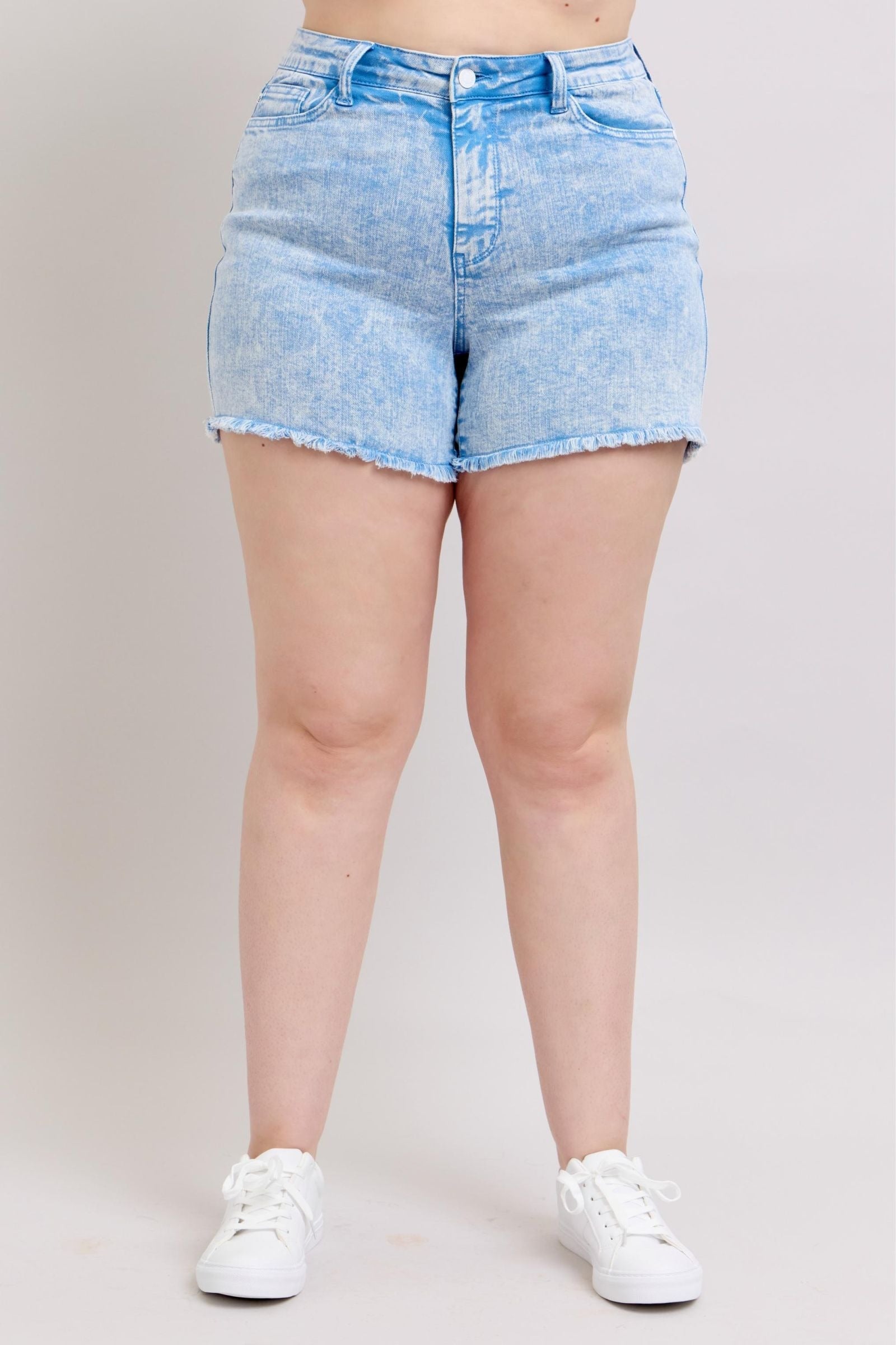 Mid-rise Judy Blue Shorts in vibrant cyan, featuring a raw hem and soft, stretchy fabric for comfort and ease.