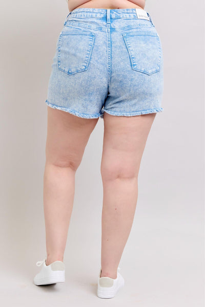 Judy Blue Shorts with mid-rise fit, vibrant cyan color, and raw hem viewed from the back.
