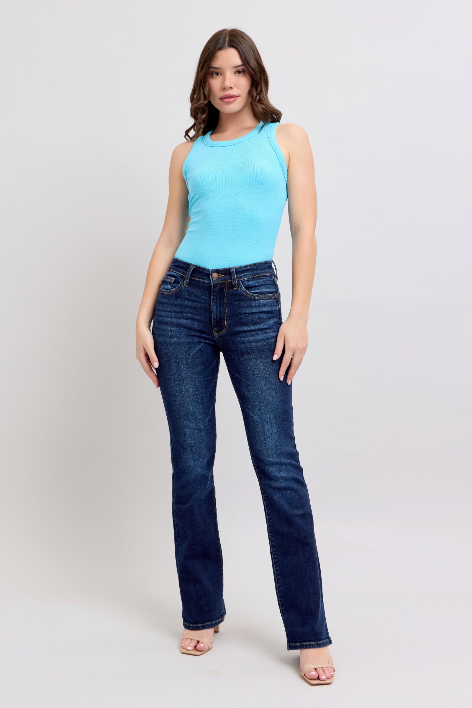 Dark wash bootcut Judy Blue Jeans 82586, side view on model.