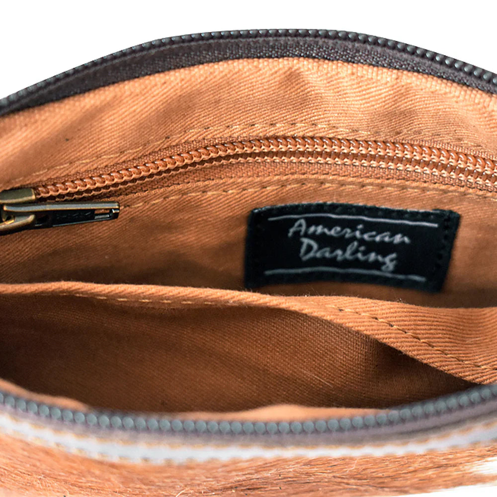Interior view of American Darling Small crossbody ADBGS142TAW showing brown fabric lining, inner zipper pocket, and brand label.