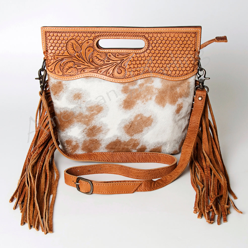 American Darling Clutch Handbag ADBGS145TAW with hand-tooled leather, cowhide hair-on detail, leather fringes, adjustable strap, and antique metal fittings