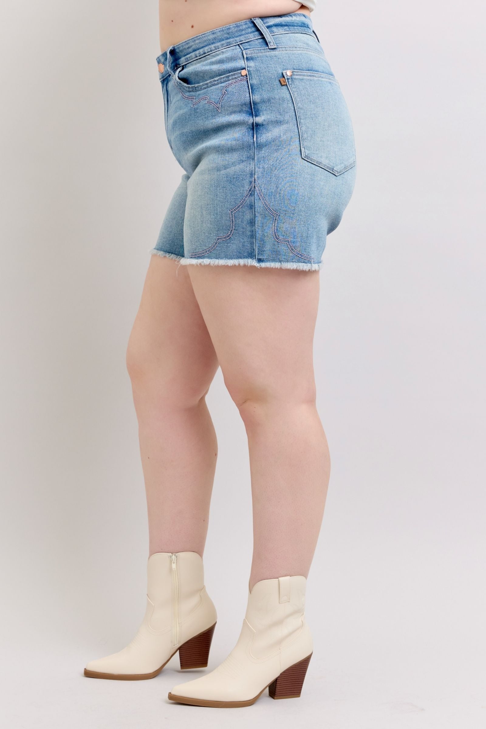 Judy Blue Shorts 150147 with high-rise, western embroidery, and raw hem.