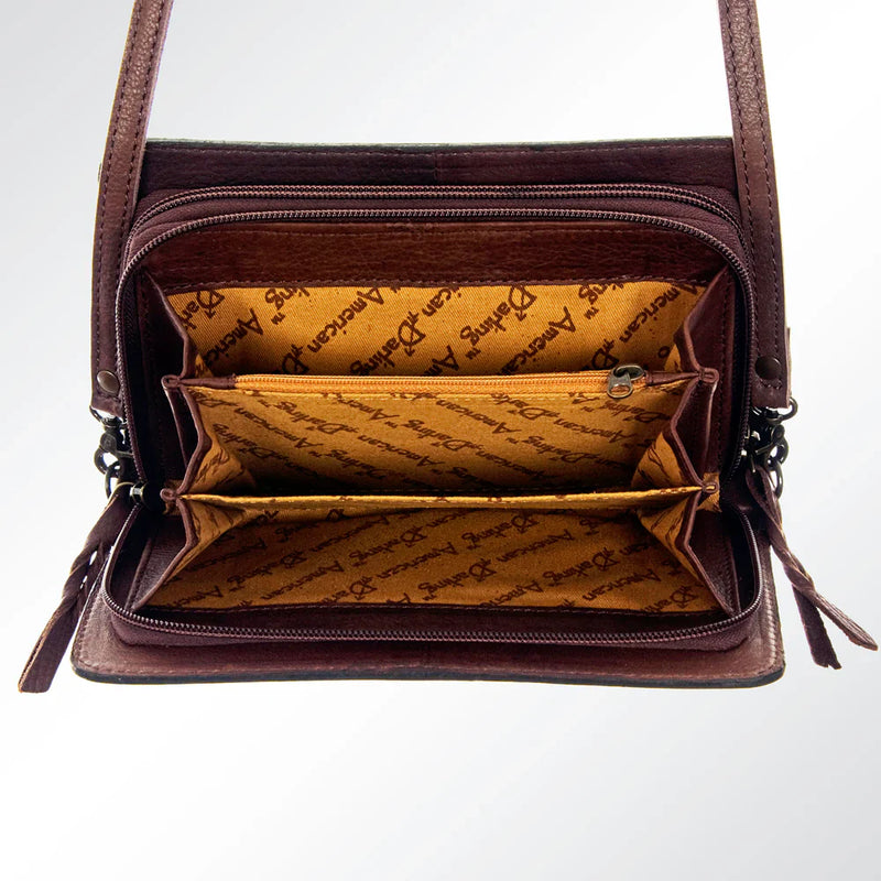 American Darling crossbody wallet with genuine hand-tooled leather and adjustable strap, open view showing multiple compartments and branded interior lining