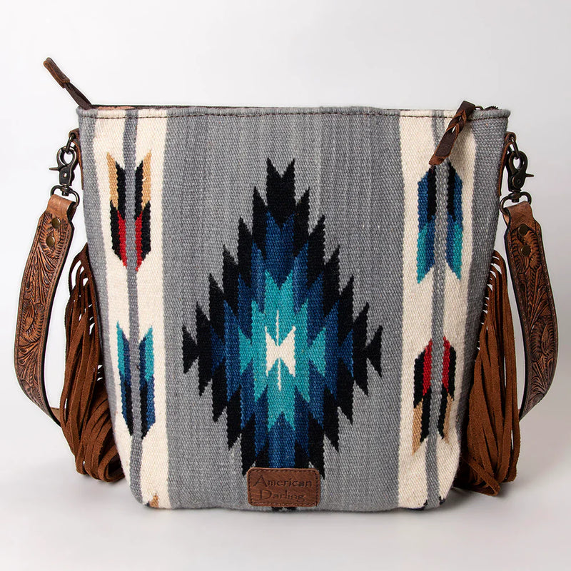 American Darling Large Crossbody Bag ADBG510D8 with hand-tooled vegetable tanned cowhide, woven wool saddle blanket, leather fringes, and adjustable strap