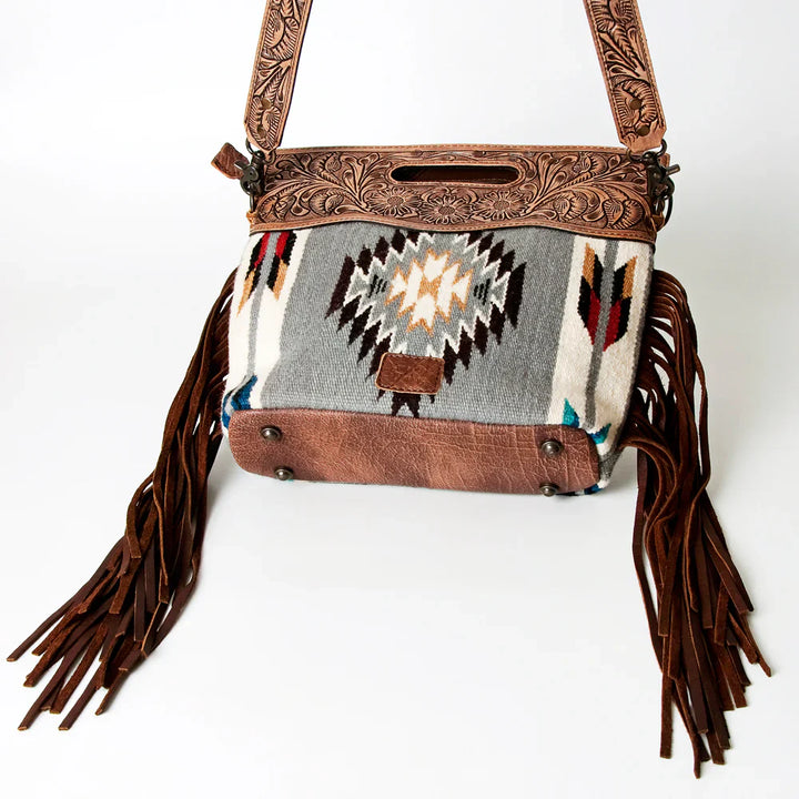 American Darling Clutch ADBG610D4 handcrafted western style bag with hand tooled leather, wool saddle blanket, and leather fringes