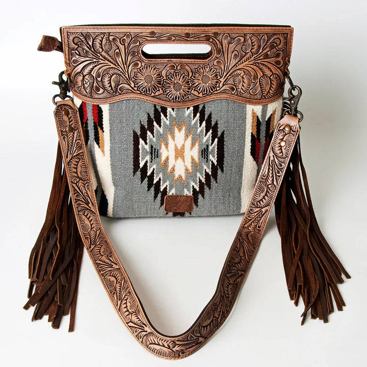 American Darling Clutch ADBG610D4 with hand-tooled leather, woven wool blanket pattern, leather fringes, and adjustable strap