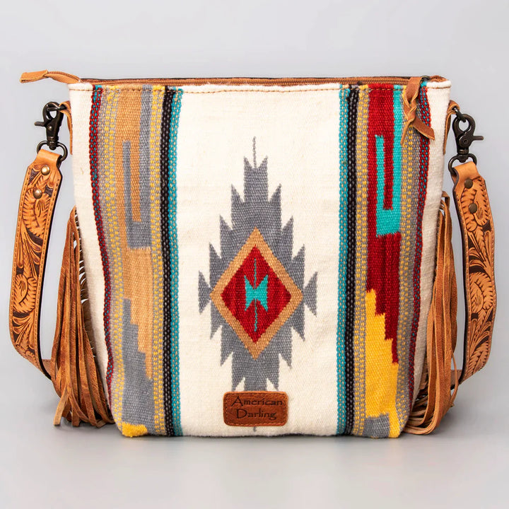 American Darling Large Crossbody Messenger Bag ADBG510TAND with hand-tooled vegetable tanned leather, western wool saddle blanket, fringes, and adjustable strap