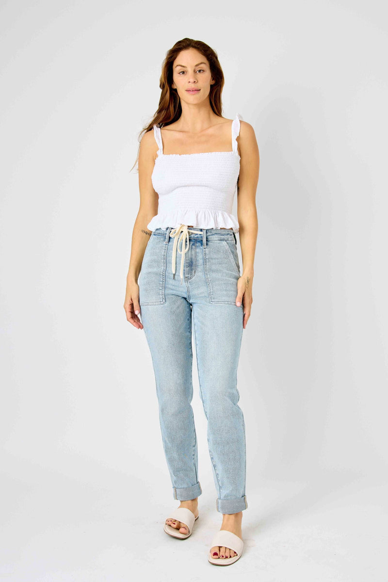 Woman wearing high waist vintage double-cuffed Judy Blue Jeans 88691 and white top