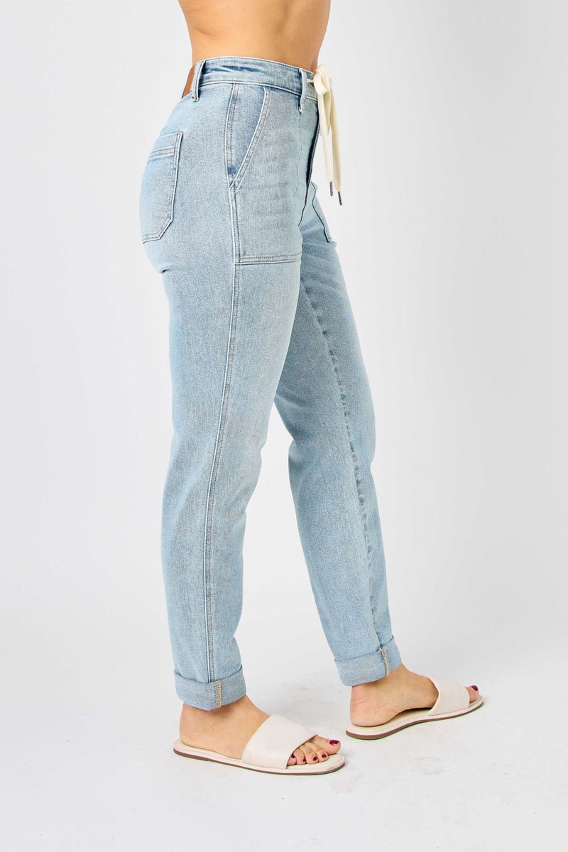 Side view of high waist vintage double-cuffed Judy Blue Jeans jogger in light wash denim