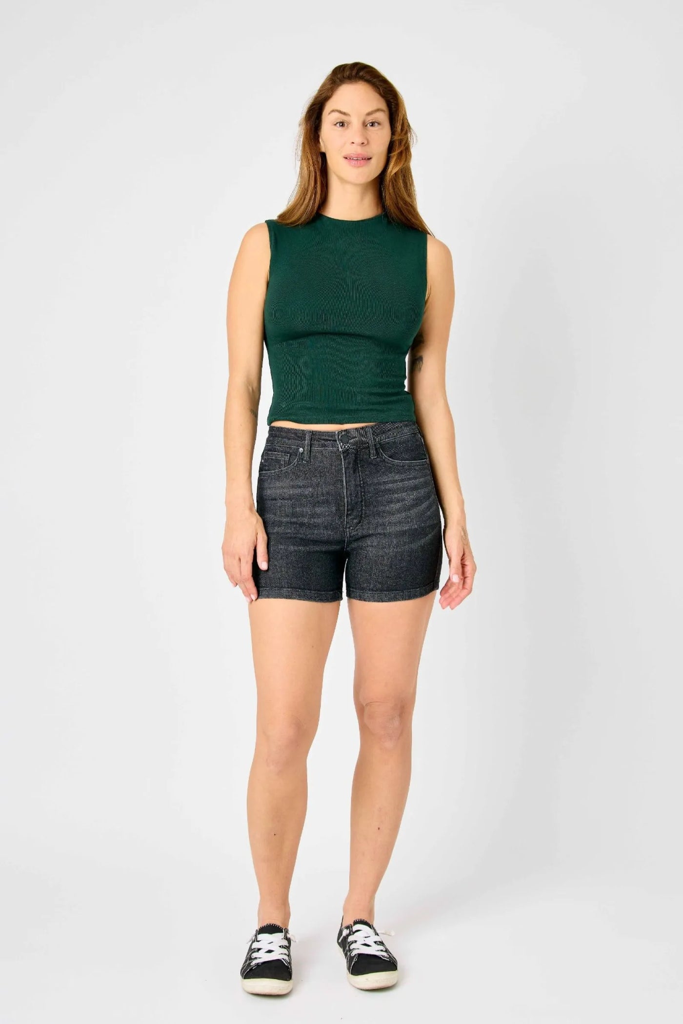 Mid-rise Judy Blue Shorts with vintage wash, tummy control, and release hem detailing.