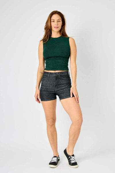 Mid-rise vintage wash Judy Blue shorts with tummy control and release hem detailing.