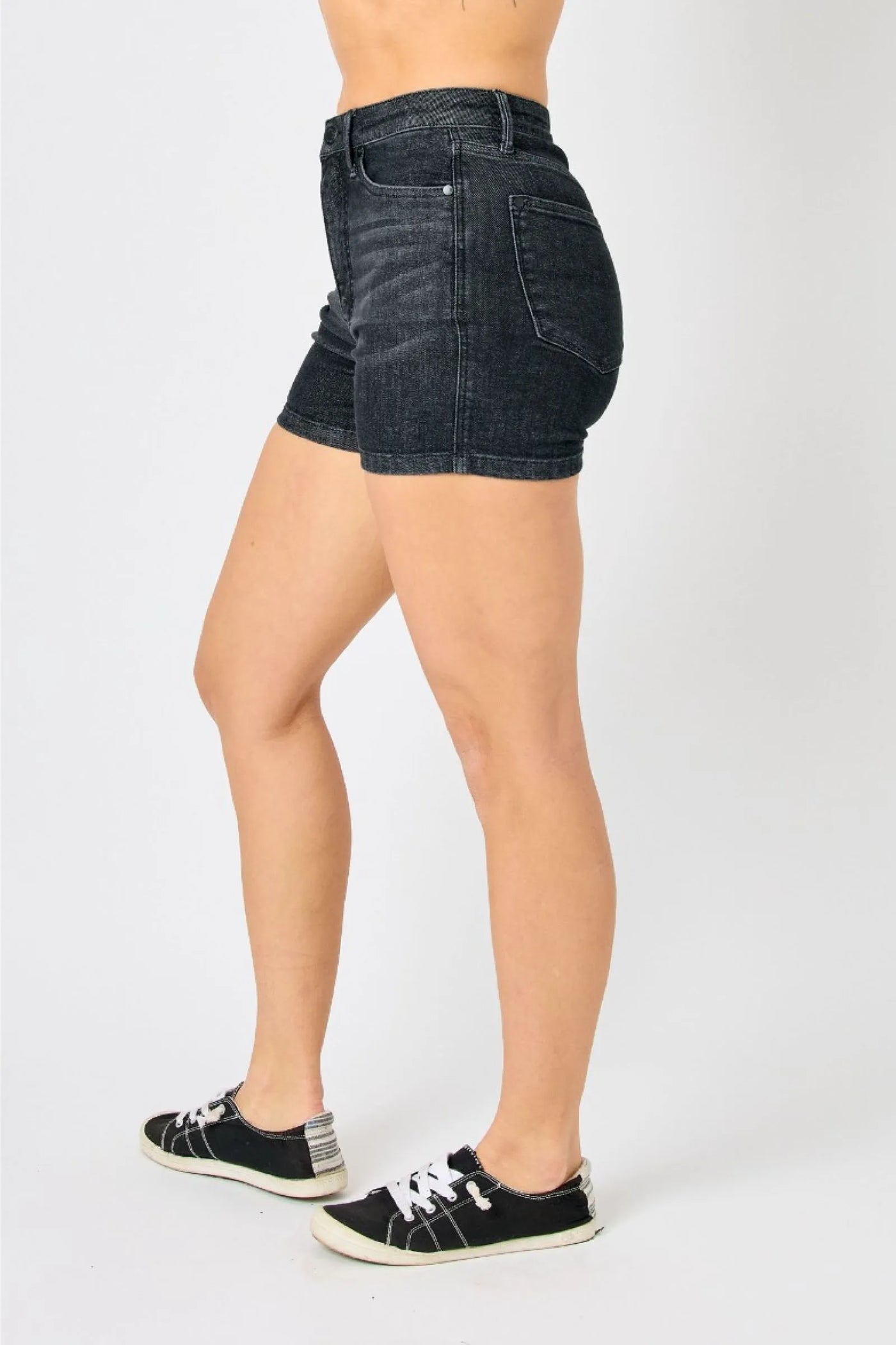 Mid-rise Judy Blue shorts with tummy control, vintage wash, and release hem detailing.
