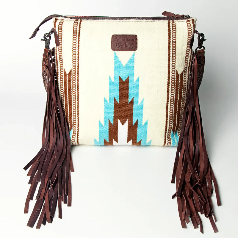American Darling Large Crossbody Messenger Bag ADBGZ306G with hand tooled cowhide leather, wool saddle blanket design, leather fringes, and adjustable strap.