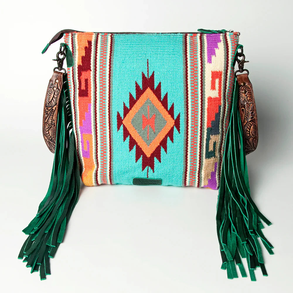 American Darling Large Crossbody Messenger Bag ADBGZ306I with hand-tooled leather, woven wool saddle blanket, and leather fringes in turquoise and multicolor design